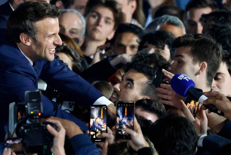 Mr Macron also praised those who gave him five more years at the helm of France. AFP